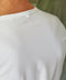 Man wearing bright plain white t-shirt 