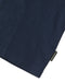 Close up of 'Outerknown' tag on a navy blue t-shirt