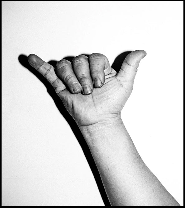 Hand making the Shaka gesture